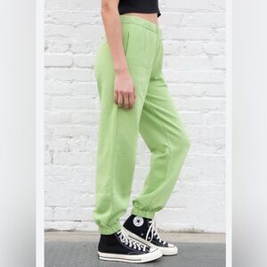 Brandy Melville lime green Rosa joggers